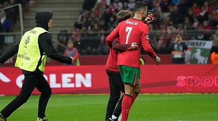 Cristiano Ronaldo's classy gesture to pitch invader as security chase goes viral after Portugal goal