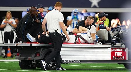 Lions' Aidan Hutchinson carted off with apparent serious leg injury