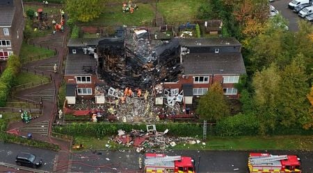 Three adults and one child taken to hospital after fire destroys home