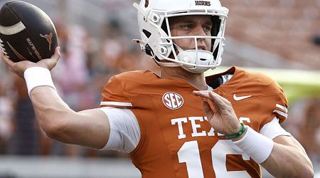 Texas' Manning replaces Ewers vs. Georgia