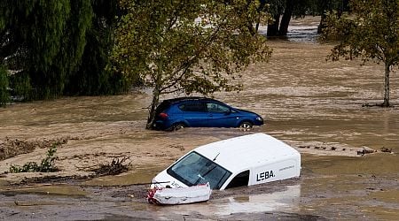 Several missing as flash floods sweep cars through the streets in Spain