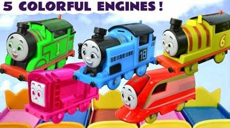 5 Colorful Toy Train Engines Jumping On The Bed