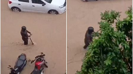 Watch: Moment e-scooter rider attempts to travel through deadly floods in Spain