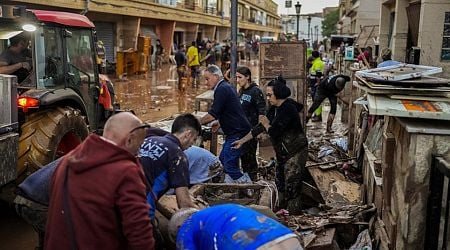 Spain searches for bodies after flood of the century claims at least 95 lives