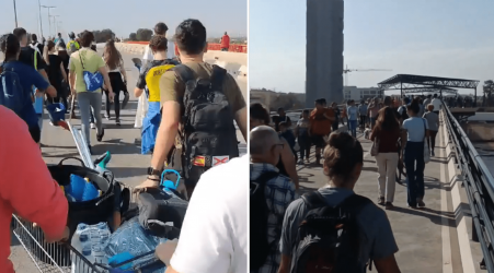 Watch: Survivors of deadly floods in Spain carry food, clothes and supplies on their backs to donate to nearby devastated villages