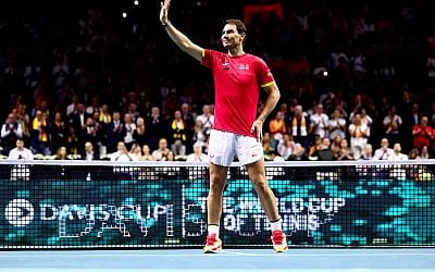 An emotional Rafael Nadal retires at the Davis Cup after he loses and Spain is eliminated