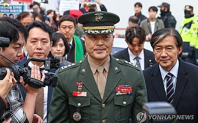 (LEAD) Military prosecutors seek 3-yr sentence for ex-Marine investigator over alleged insubordination