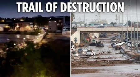 Horrifying moment Spanish floods take out entire bridge in seconds in town where 40 killed