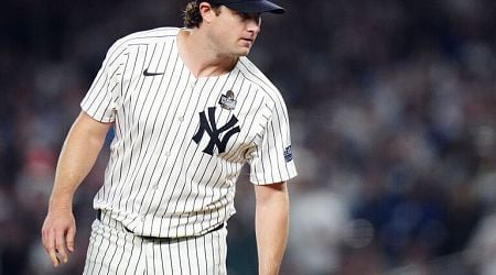 Report: Cole stays with Yankees on original 4-year deal