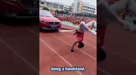 Chinese teacher pulls CAR while doing handstand