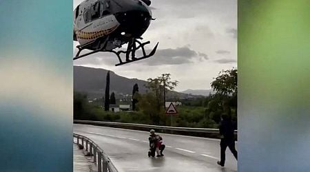 Helicopter crew rescues child from house in flood-hit Spain