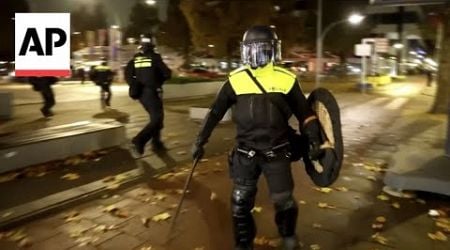 Dutch police disperse people from streets after Amsterdam tram set on fire