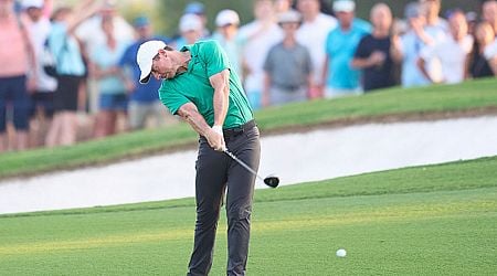 Rory McIlroy claims share of lead after opening round in Dubai