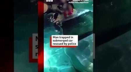 US man rescued from car submerged in pool. #US #Police #BBCNews