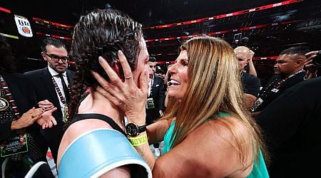 Katie Taylor embraced by her mother Bridget after win over Amanda Serrano