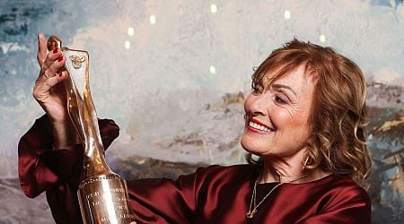 Mary Kennedy stuns in burgundy as she's honoured with a Lifetime Achievement Award