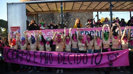 Activists strip off in demo against violence on women