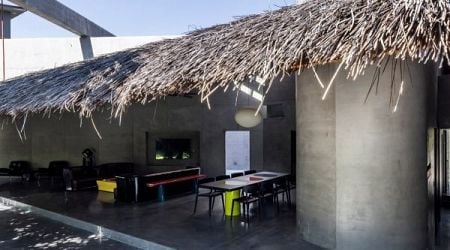 Kientruc O tops sculptural Thu House with large thatched roof in Vietnam