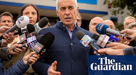 Shock in Romania as hard-right Nato critic Calin Georgescu takes lead in presidential election