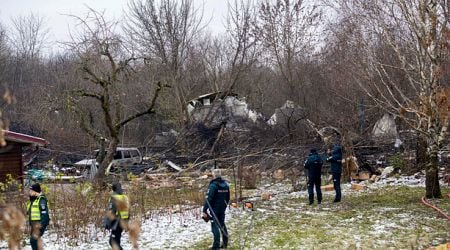 One dead and three injured after cargo plane crashes into house in Lithuania