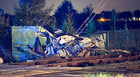 Two killed after police chase ends with crash into train