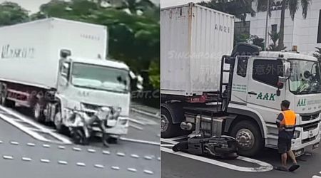 Motorcyclist in blind spot almost gets run over by container truck at Tuas West traffic junction