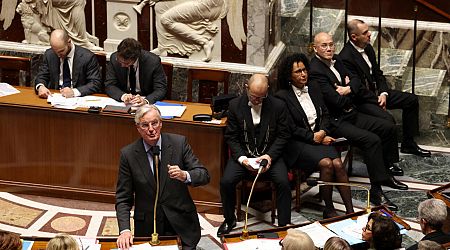 French government still shaky as lawmakers compromise on budget bill