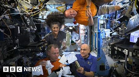 Astronauts unbox Thanksgiving meal aboard ISS