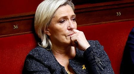 France's budget battle offers Le Pen a reprieve as court decision looms