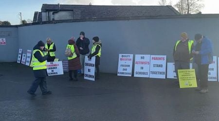 Enoch Burke supporters call for his release from jail during protest at former school