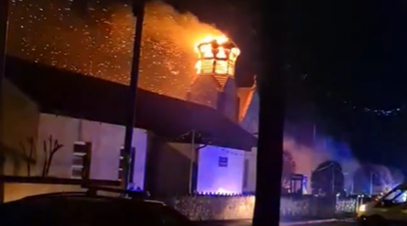 WATCH: Church spire in Clare crashes to the ground in flames after being struck by lightning