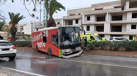 Driver trapped as car, bus collide on Regional Road