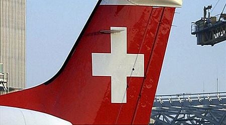 Swiss Air flight diverts with smoke on board; crew member, 10 passengers hospitalized