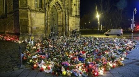 Candles and flowers flood makeshift memorial for Magdeburg market attack