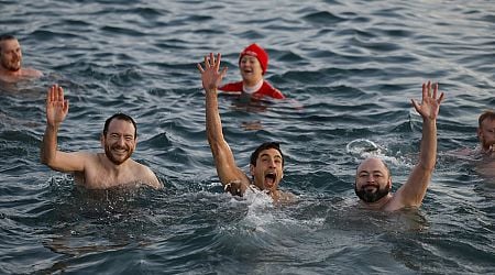 Tailbacks from Forty Foot stretch for miles as Christmas swimmers descend