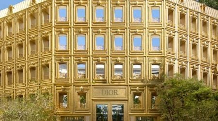 Dior wraps Bangkok concept store in golden replicas of HQ facade