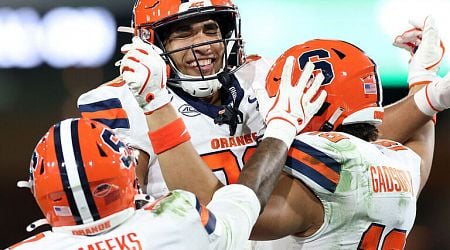 McCord's historic night helps Syracuse beat WSU in Holiday Bowl