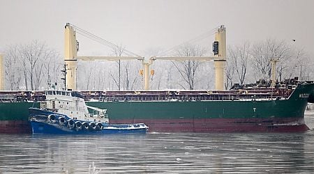 Merchant ship runs aground in St. Lawrence River near Montreal, requiring a rescue attempt