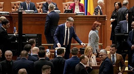 Romanian lawmakers narrowly approve new pro-European coalition during period of political turmoil