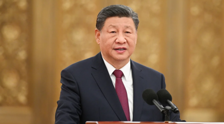 China's Xi says no one can stop unification with Taiwan