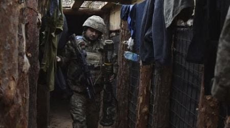 Ukrainian soldiers mark a third New Year on the frontlines as Russian attacks continue