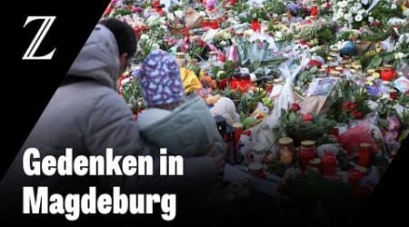 Menschen trauern an Heiligabend um Opfer von Attentat