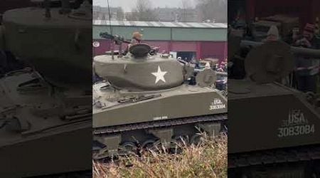 A pair of Sherman tanks sounding glorious in Belgium