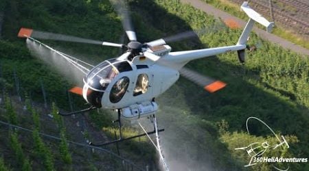 Amazing spraying action with MD500D helicopter