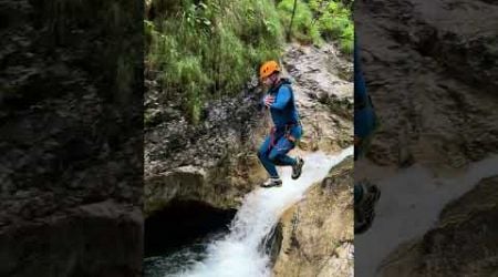 Taking a plunge into a mountain stream - canyoning in Bovec, Slovenia #canyoning #slovenia