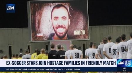 Ex-soccer stars join hostage families in friendly match