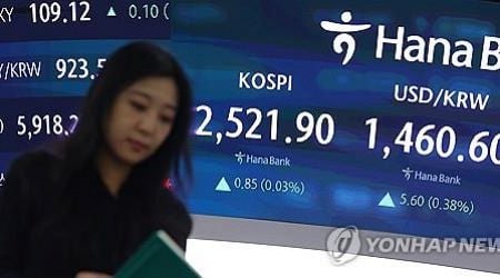 Seoul shares open slightly higher on chip gains