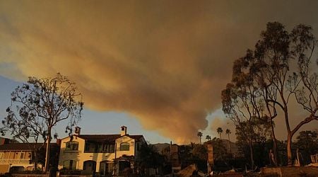 With their Los Angeles-area homes still smoldering, families return to search the ruins for memories