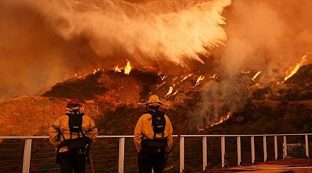 Firefighters race to contain LA wildfires as winds forecast to return