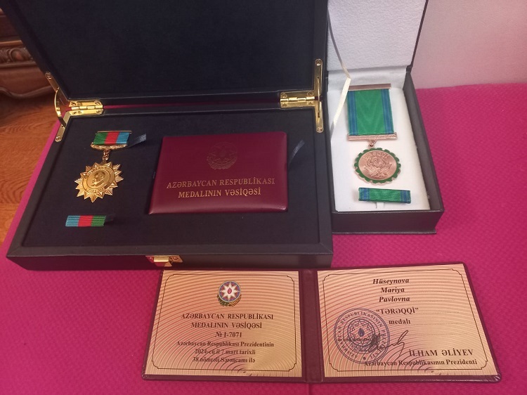 Azerbaijani President Awards Medals to Editor-in-Chief of AKORD Magazine